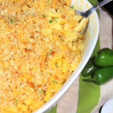 Macaroni and cheese casserole in white dish.