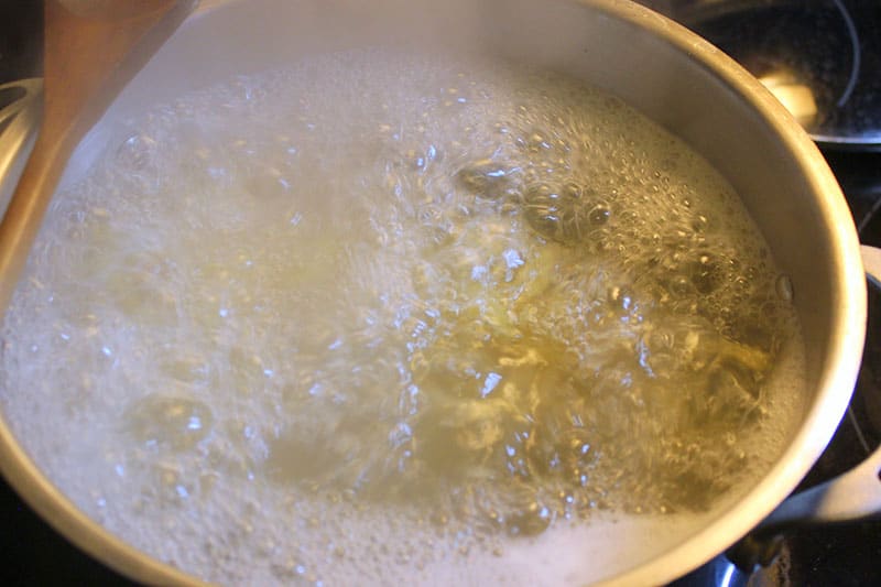 Water boiling in metal pot.