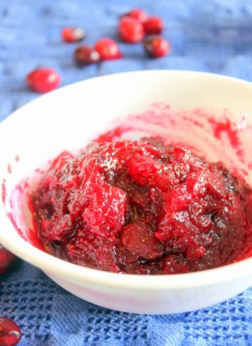 Cranberry sauce in white bowl.