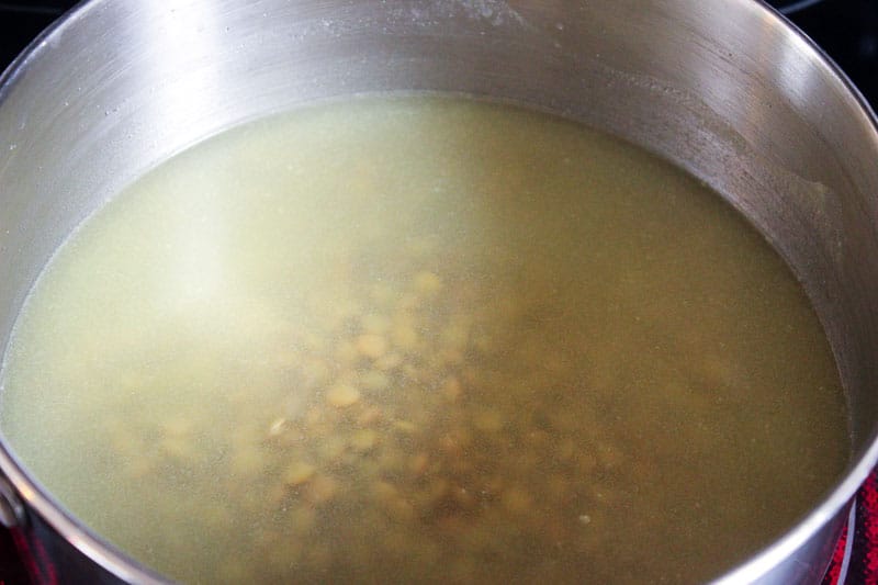 Lentils Covered with Water in a metal pot.