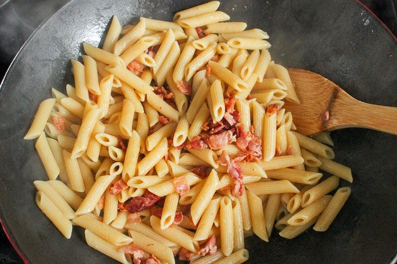 Pasta and Bacon Mixed in Wok.