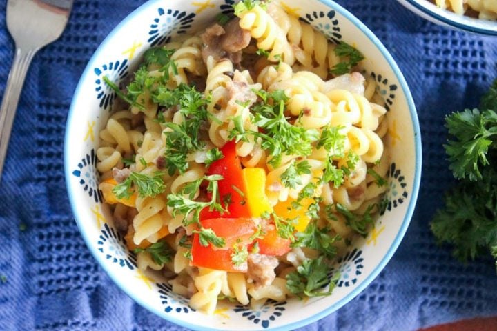 Sriracha Pasta Topped with Parsley in White Bowl.