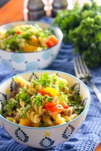 Sriracha Ranch Pasta topped with Parsley in White and Blue Bowl.