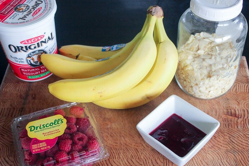 Yogurt Bowl Ingredients on Wooden Board.