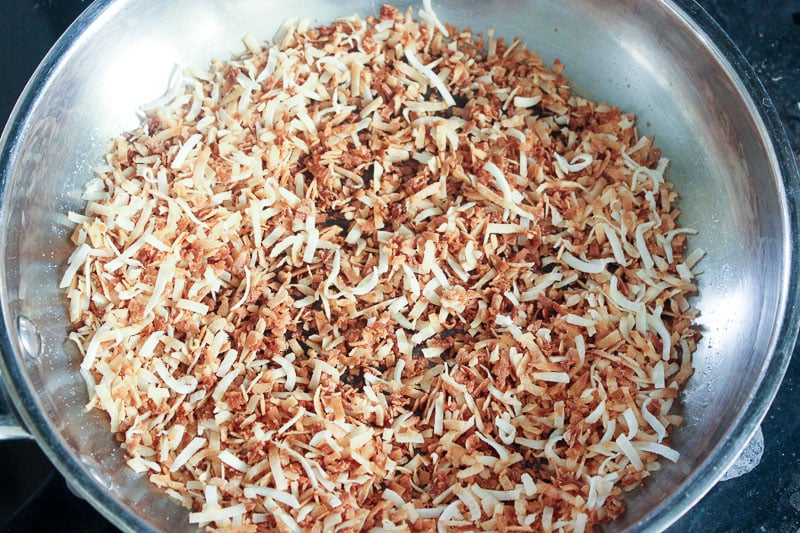 Toasting Shredded Coconut in Frying Pan.