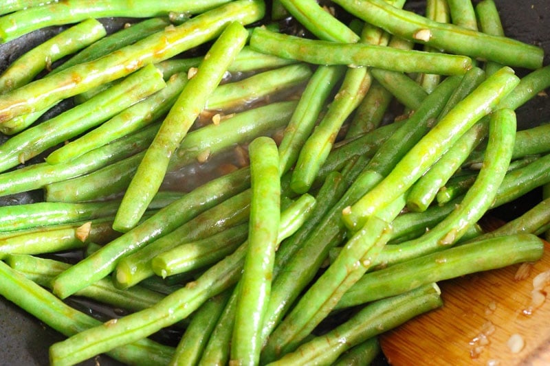 Green Beans and Garlic Frying in Wok.