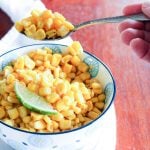 This Easy Mexican Corn is the quickest dish you'll make all summer! Sweet corn, smoky chili powder, zesty lime and creamy butter make it addictively tasty, and frozen corn means you can have it any time of year! Ready in 5 minutes!