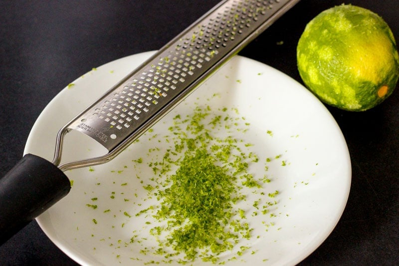 Lime Zest on White Plate.