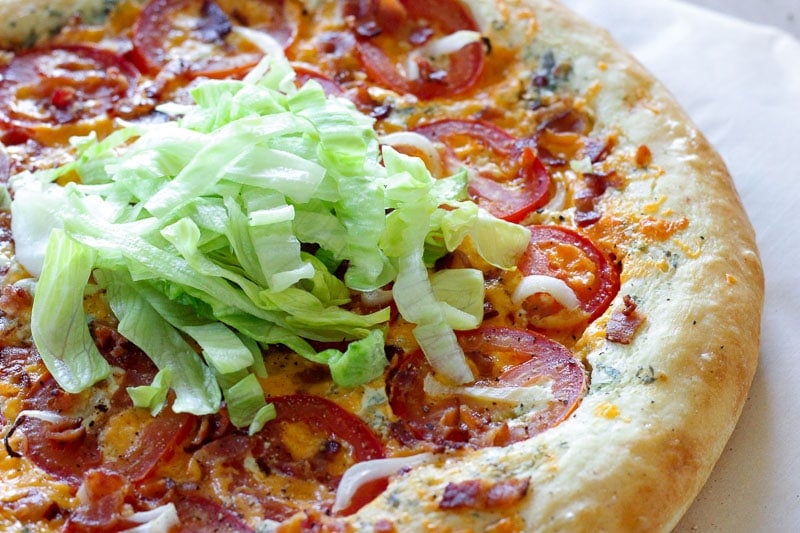 Bacon, Lettuce and Tomato Pizza on Parchment Paper.