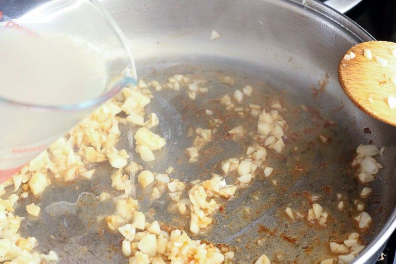 Frying Garlic in Frying Pan.