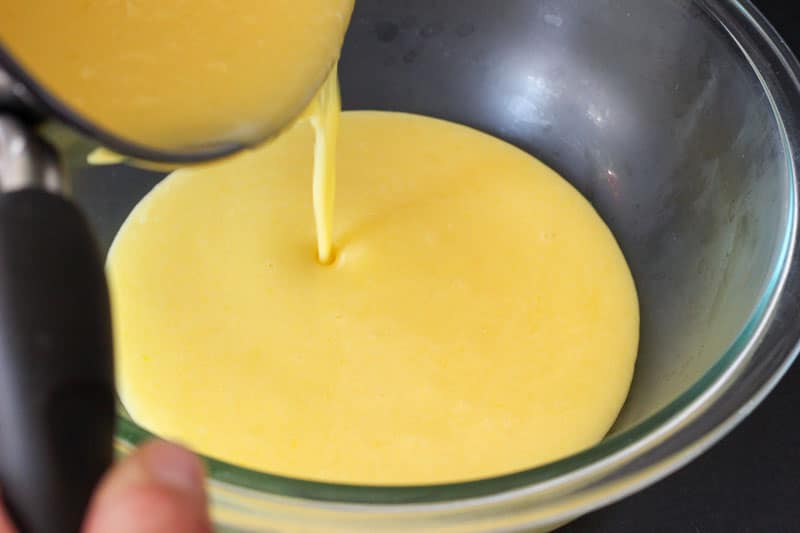 Pouring Lemon Curd into Glass Bowl.