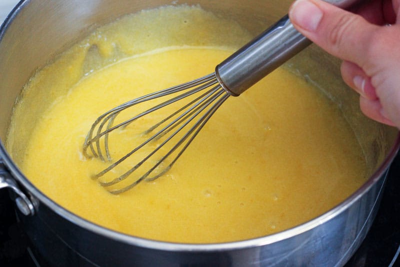Mixing Lemon Mixture in Metal Bowl with Whisk.