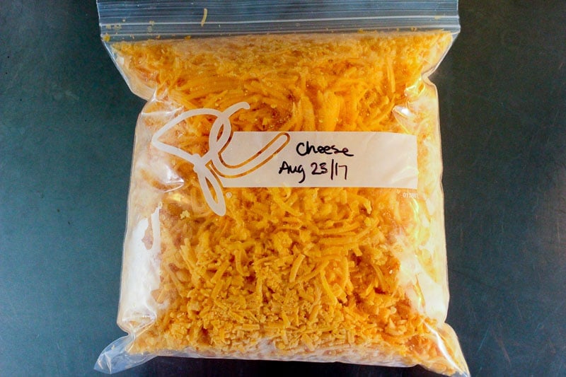 Shredded Cheddar Cheese in Resealable Plastic Bag.