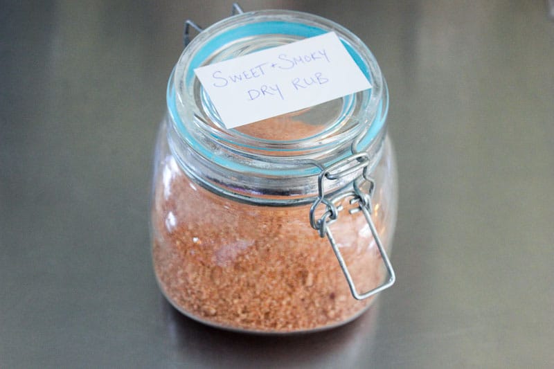 Sweet and Smoky Dry Rub Mix in small glass jar.