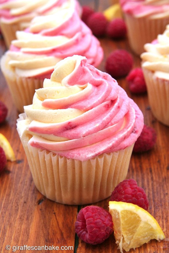 Cupcake topped with Lemon and Raspberry Frosting.
