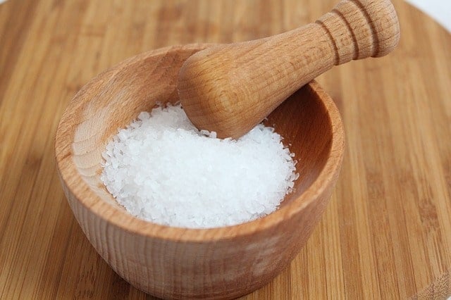 kosher salt in a dish with a pestle