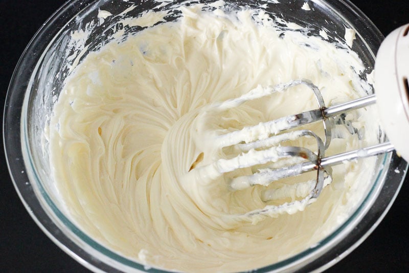 Mixing Cream Cheese Mixture in Glass Bowl.