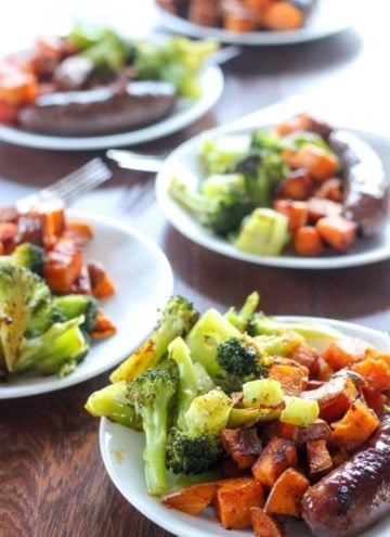 Plates of sausages, sweet potatoes and broccoli