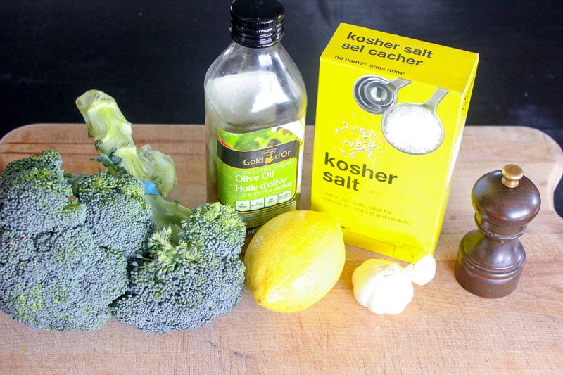 Oven Roasted Broccoli Ingredients on Wooden Board.
