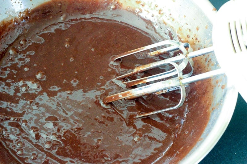 Chocolate Pudding in Metal Mixing Bowl.