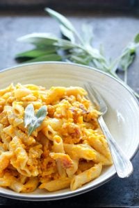 Butternut Squash Pasta topped with Sage in White Bowl.