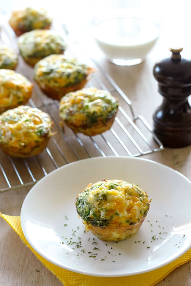 Sausage and Egg Breakfast Muffin on White Plate.