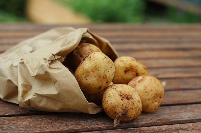 Potatoes in a paper bag.