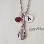 Necklace with a Whisk Pendant.
