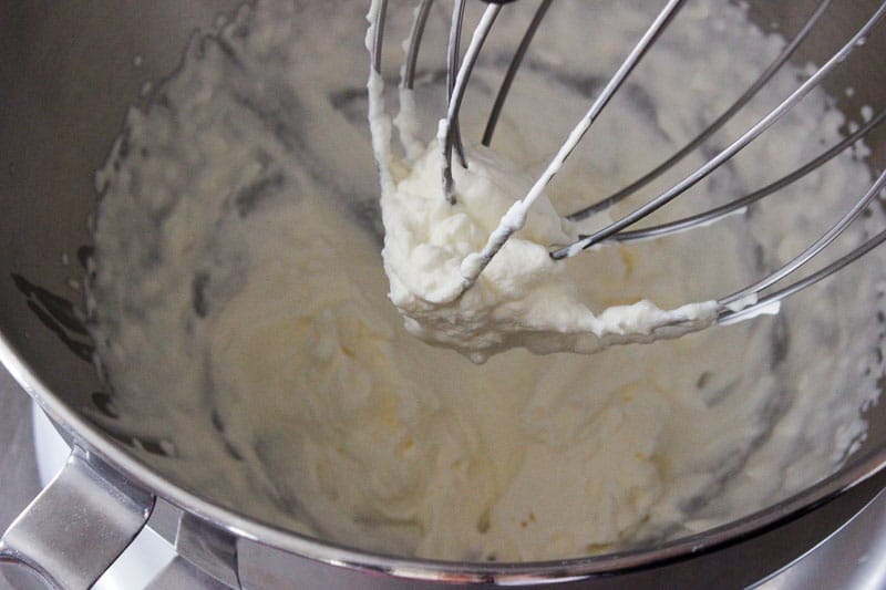 Mixing Whipping Cream in Metal Mixing Bowl.