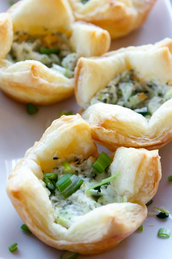 Light and elegant, these make the best finger food for any kind of party! Herb and Goat Cheese Puff Pastry Bites - An Easy Party Appetizer!