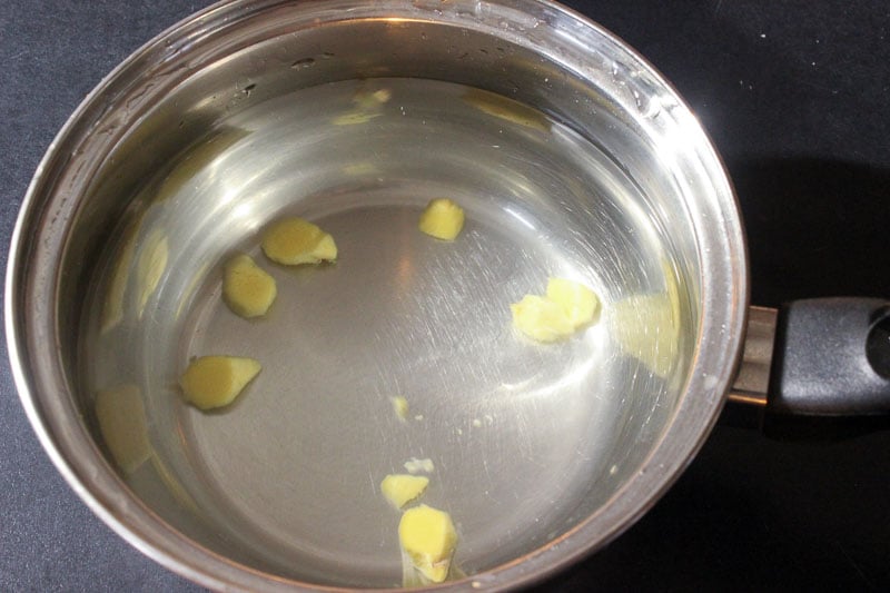 Boiling Sliced Ginger in Metal Pot.