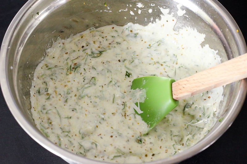 Greek Marinade Mixture in Metal Mixing Bowl.