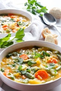 Hearty Vegetable Soup in White Bowl.