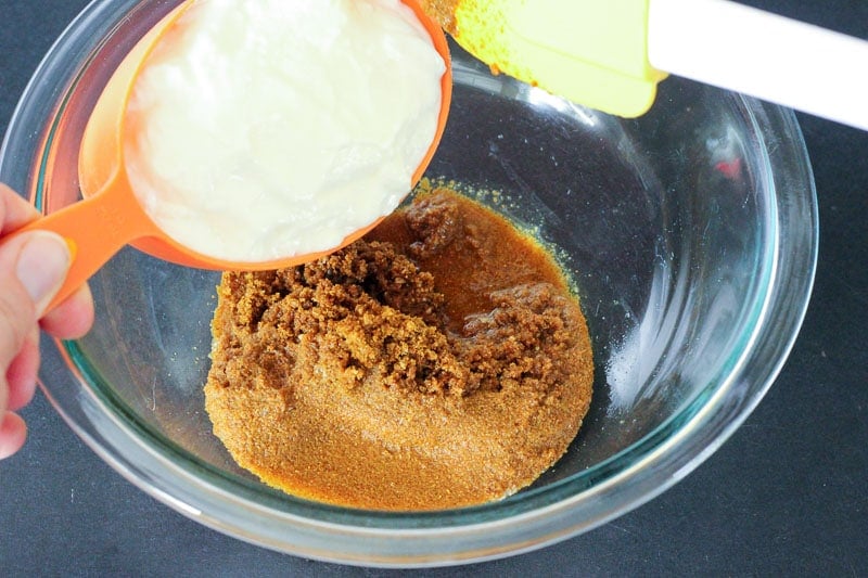 Adding Yogurt to Toasted Spice Mixture in Glass Bowl.