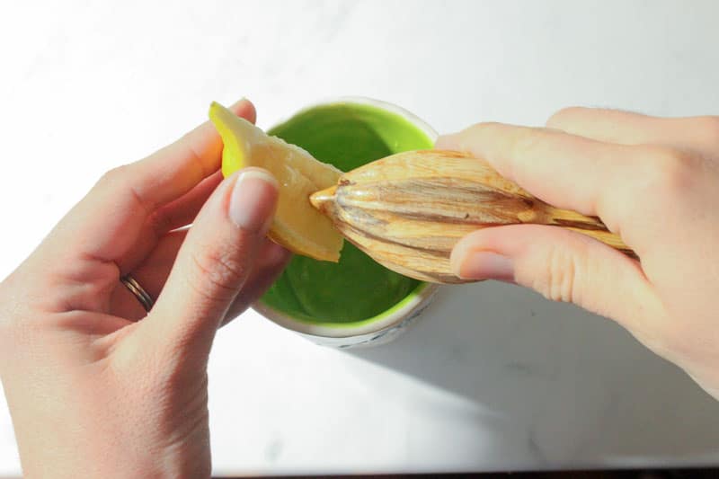 Juicing Lemon with Wooden Reamer.