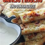 East Coasters, these Homemade Garlic Fingers and Donair Sauce are for you! And for any friends you want to convert to lovers of the most delicious appetizer around. Whether you need party food for adults, OR kids, easy snacks for tailgating or Super Bowl, or cheap recipes for entertaining, THIS is your recipe. Enjoy!