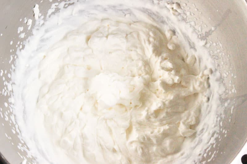 Whipping Cream in Metal Bowl.