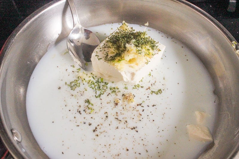 Cream Cheese Milk and Herbs in Frying Pan.