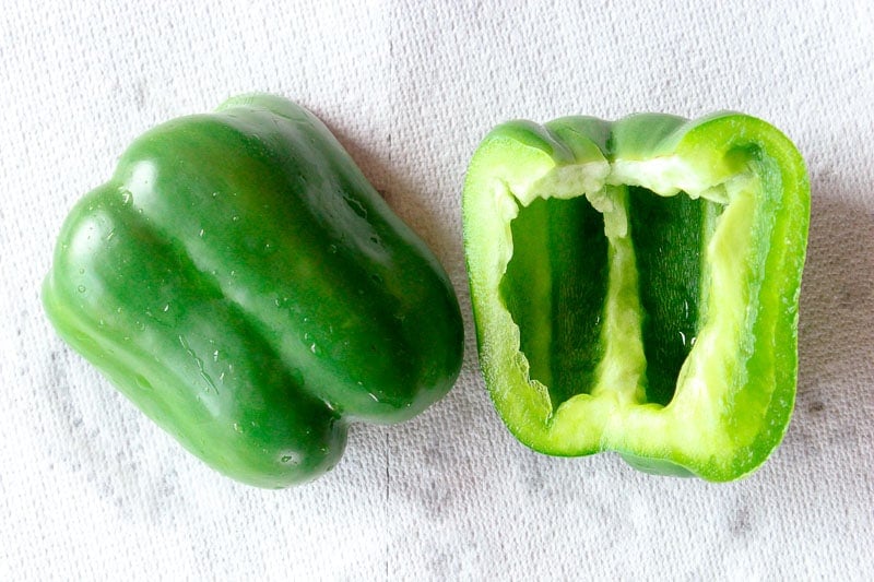 Sliced Green pepper on White Cloth.