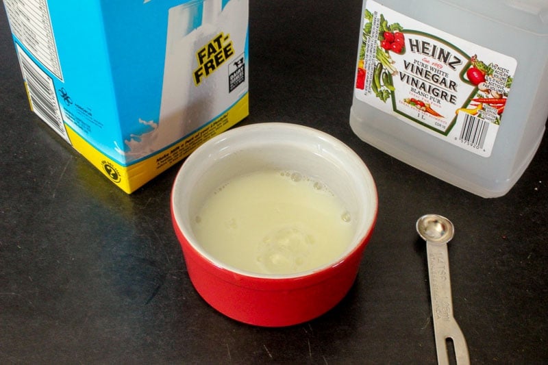 Milk and White Vinegar Mixed in Small Red Ramekin.
