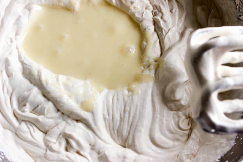 Condensed Milk Poured On Top of Whipped cream.