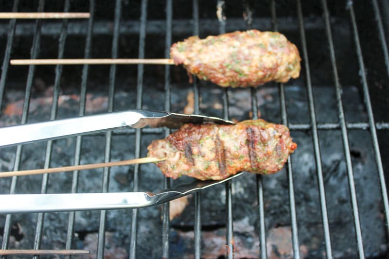 Grilling beef kebabs on the bbq.