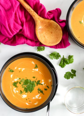 Bowl of orange Thai butternut squash soup ready to eat!