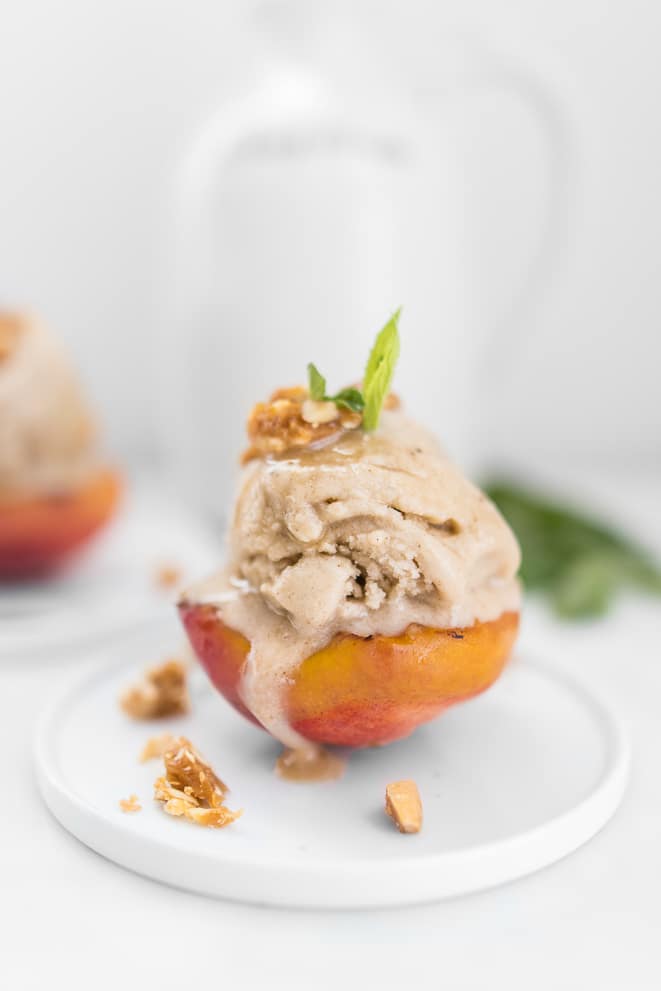 Banana ice cream on roasted peach