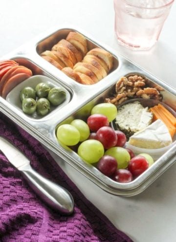 Healthy snacks inside metal rectangular pan.