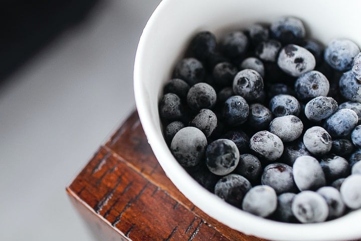 Small dish of frozen blueberries