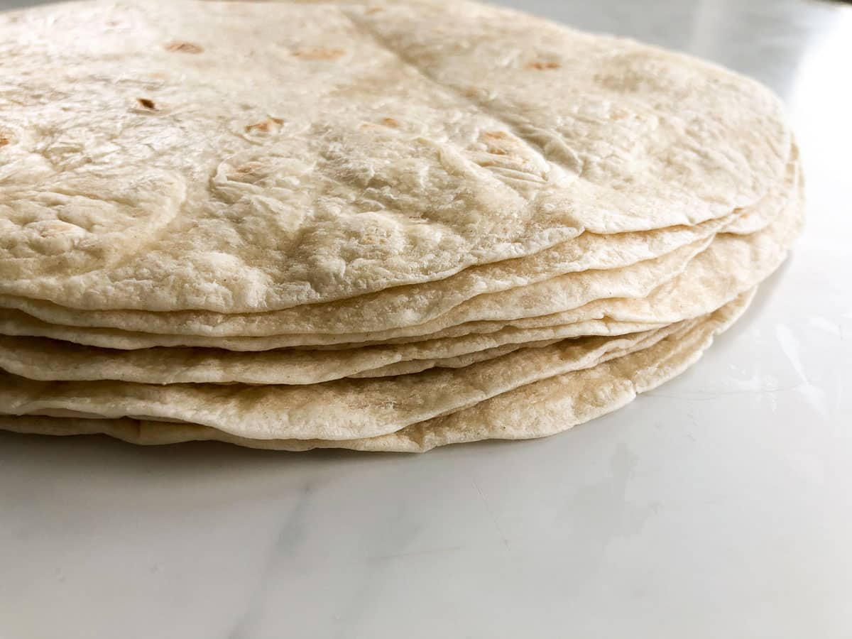 Up close picture of a stack of flour tortillas